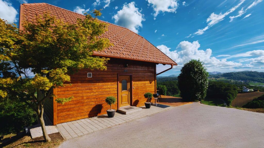 Scarlet Haven holiday house at Brioni Hills with scenic hillside view and wooden facade